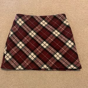 Red plaid mini skirt.